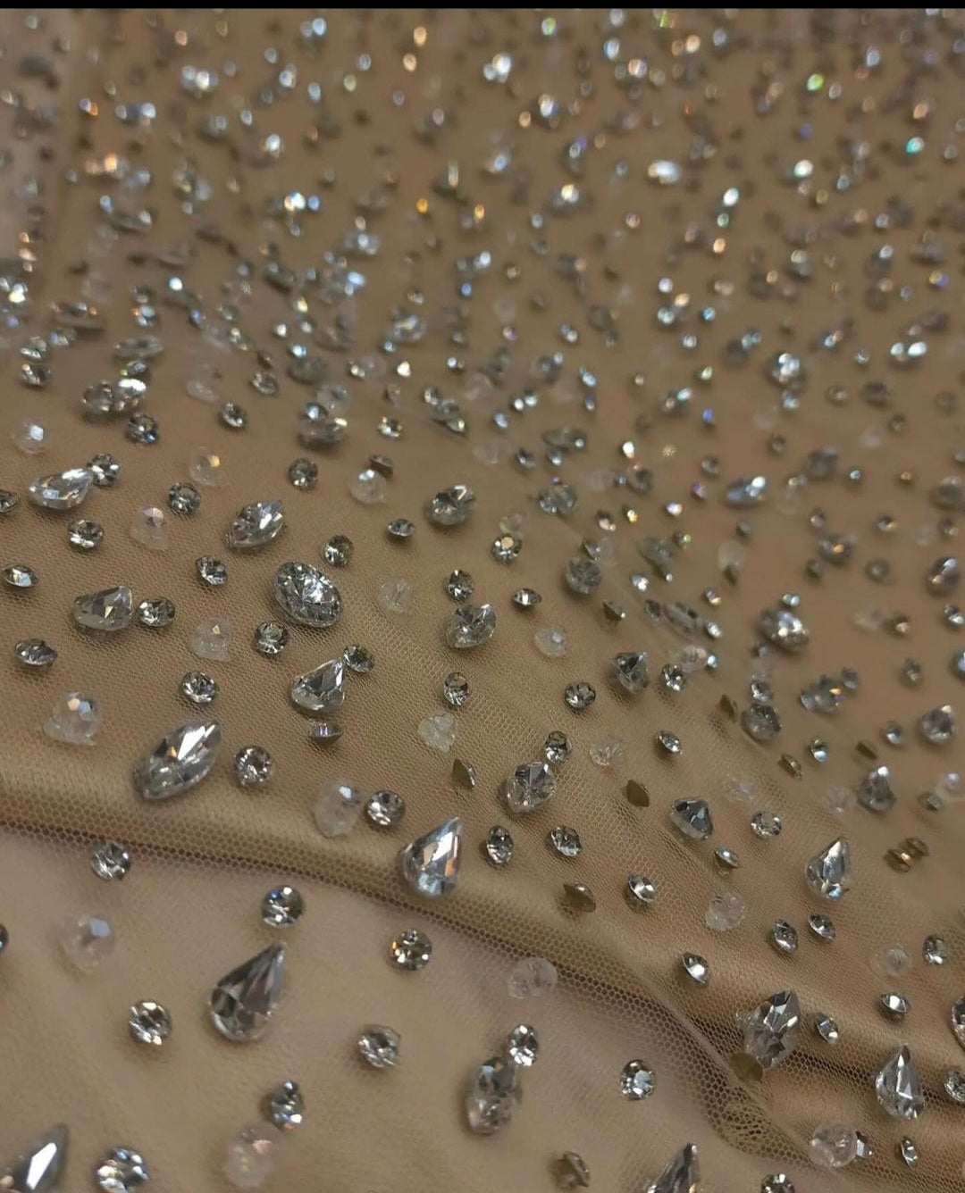 Sparkling Elegance: Hand-Beaded Swarovski Stones Fabric - Mk Zariwala