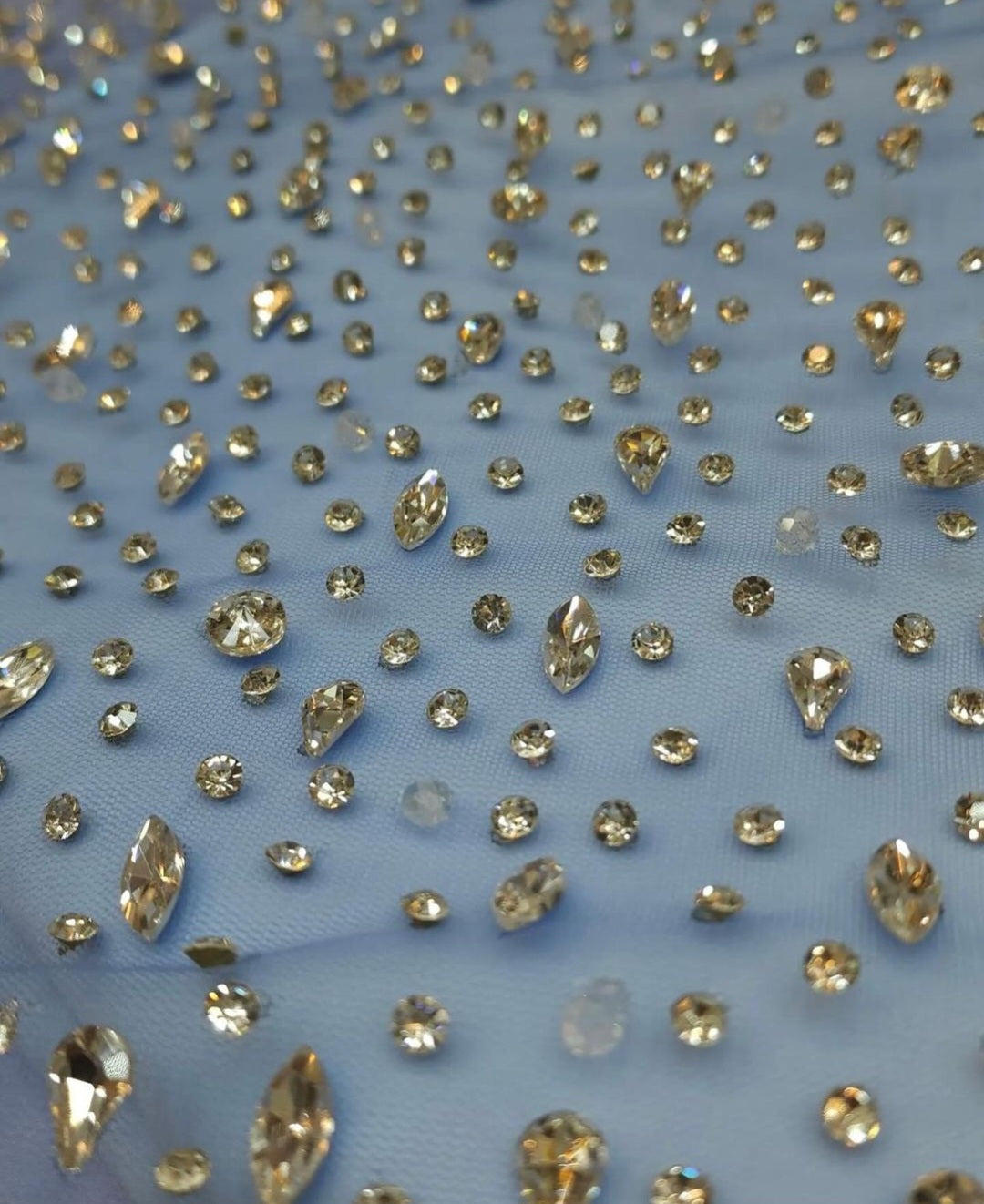 Sparkling Elegance: Hand-Beaded Swarovski Stones Fabric - Mk Zariwala