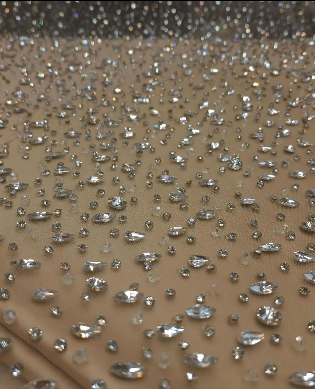 Sparkling Elegance: Hand-Beaded Swarovski Stones Fabric - Mk Zariwala
