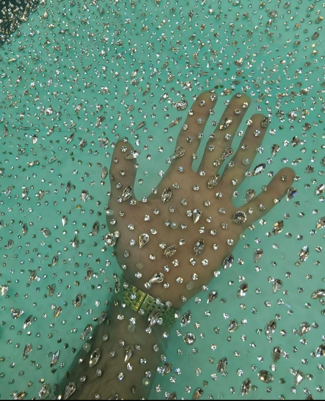Sparkling Elegance: Hand-Beaded Swarovski Stones Fabric - Mk Zariwala
